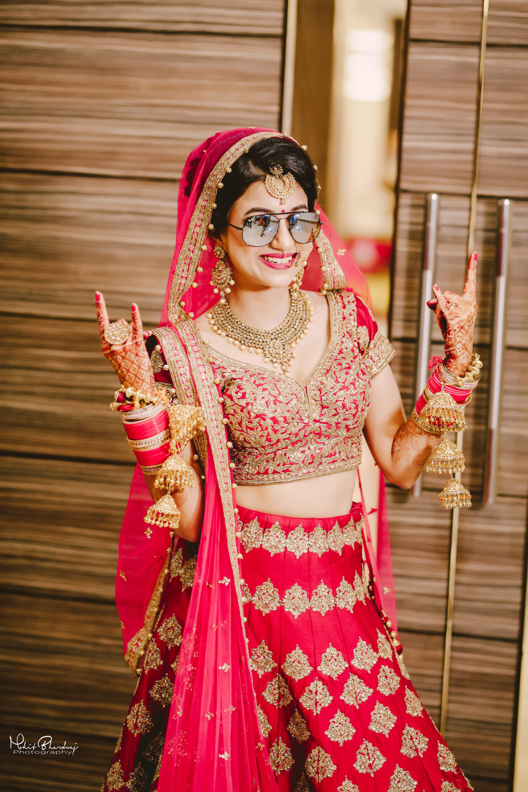 Beautiful Indian bride in traditional wedding dress and posing Stock Photo  - Alamy