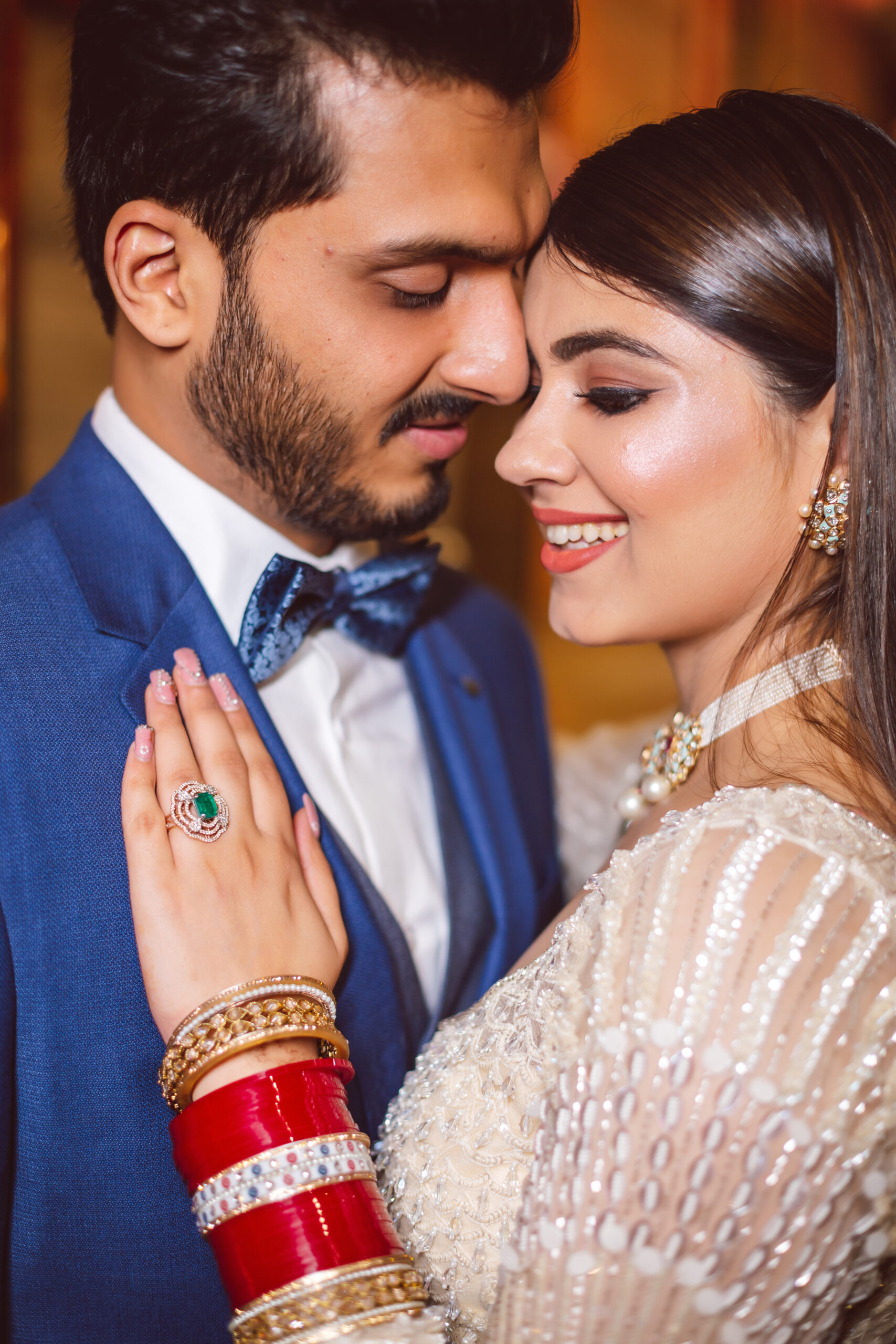 Portrait of newly married Indian couple holding hands Stock Photo | Adobe  Stock