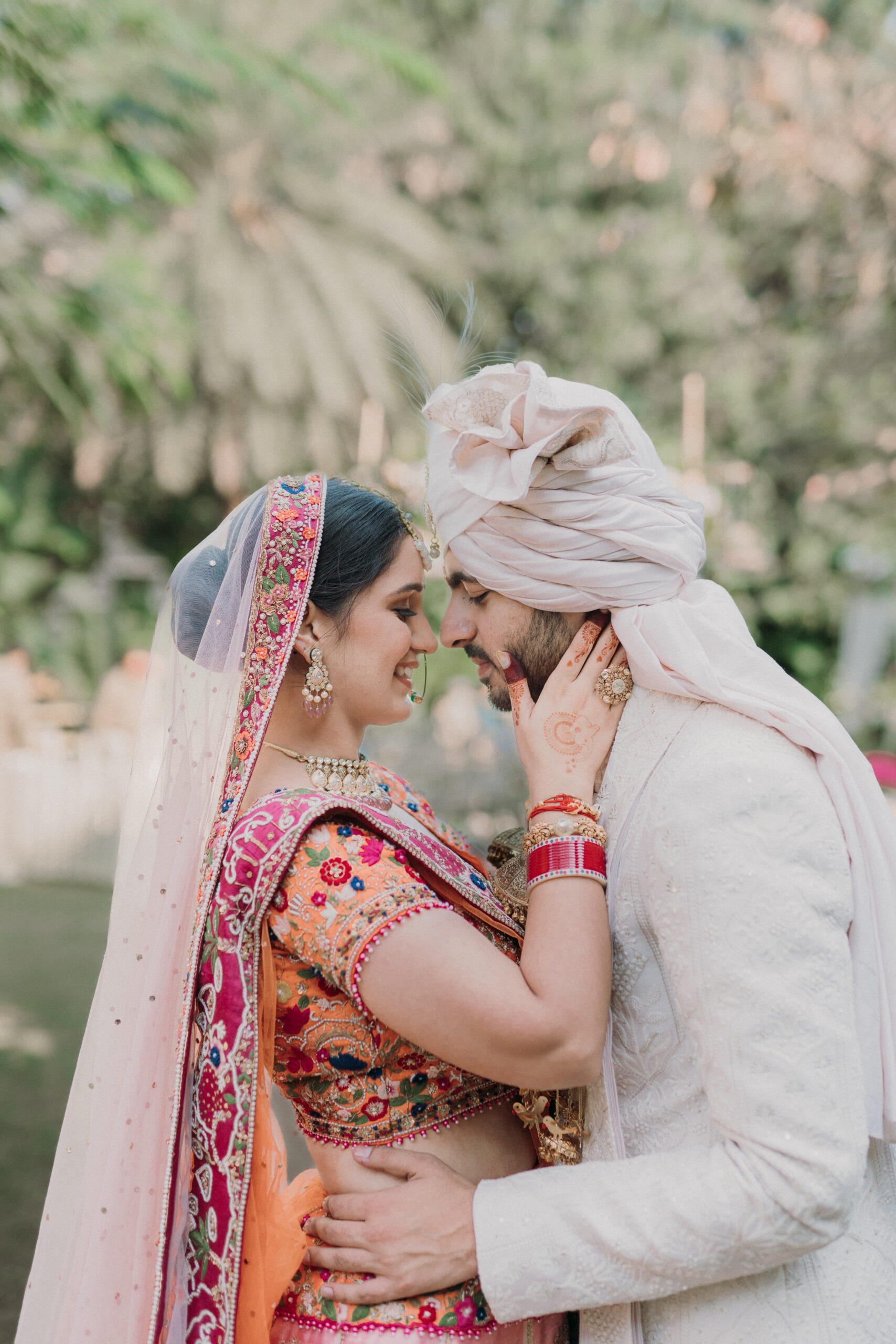 Free Photos - A Man And A Woman Are Wearing Traditional Wedding Attire,  Symbolizing Their Love And Commitment To Each Other. They Are Embracing  Each Other And Posing For A Memorable Photograph.
